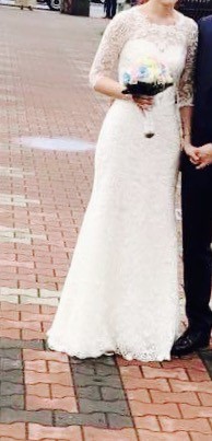 Śmietankowa, koronkowa suknia-syrenka