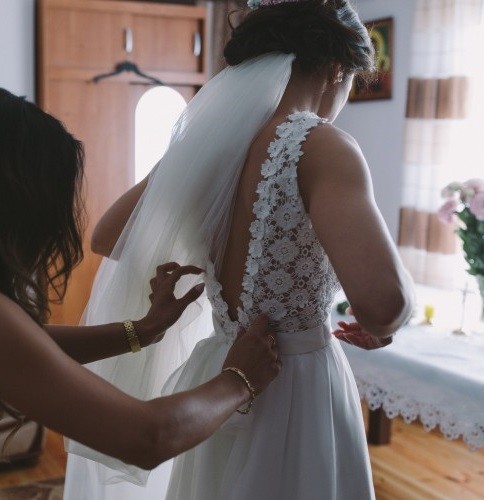 Sprzedam suknie ślubną z kolekcji MiaLavi, biała .