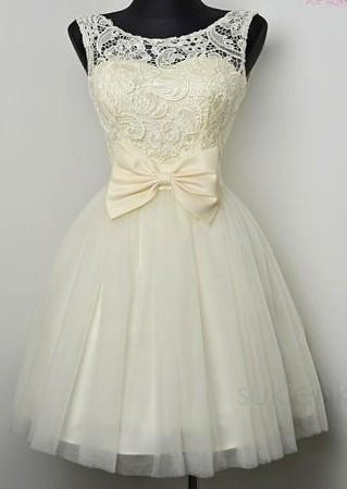 Sukienka r.36 koronka, odpinana kokarda