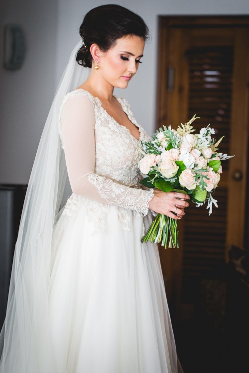 Piękna suknia ślubna zaprojektowana przez Patrycję Pardykę