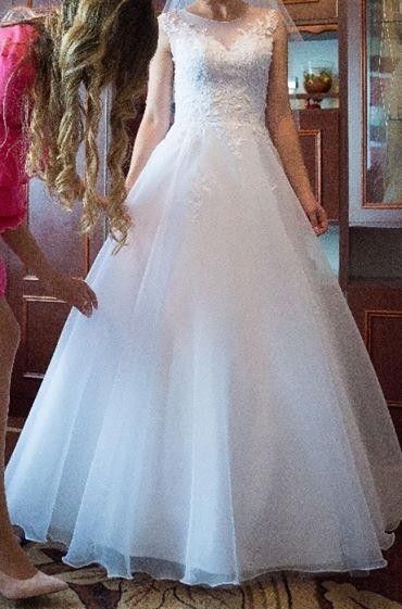 wyjatkowa suknia ślubna