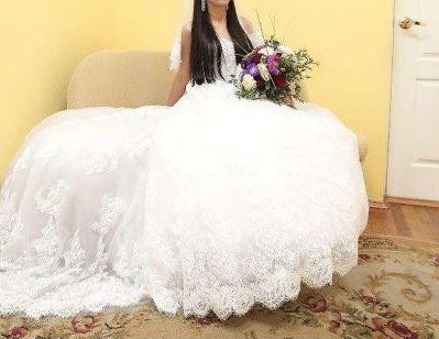 Elegancka koronkowa Sukienka Ślubna