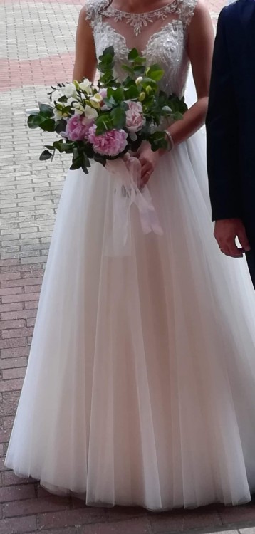 Sprzedam brzoskwiniową suknię ślubną