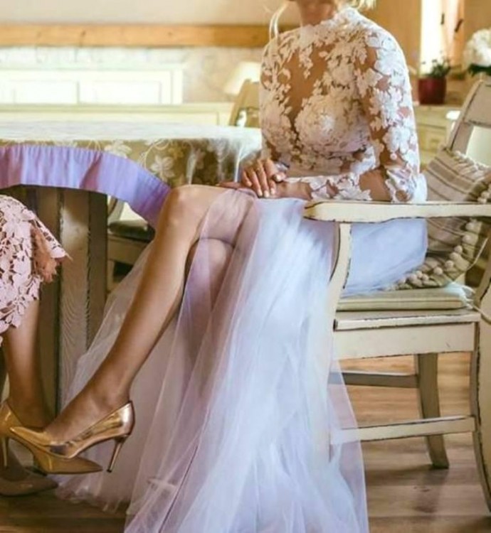 Suknia ślubna koronka długi rękaw odkryte plecy