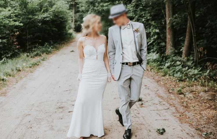 Piękna suknia ślubna z trenam