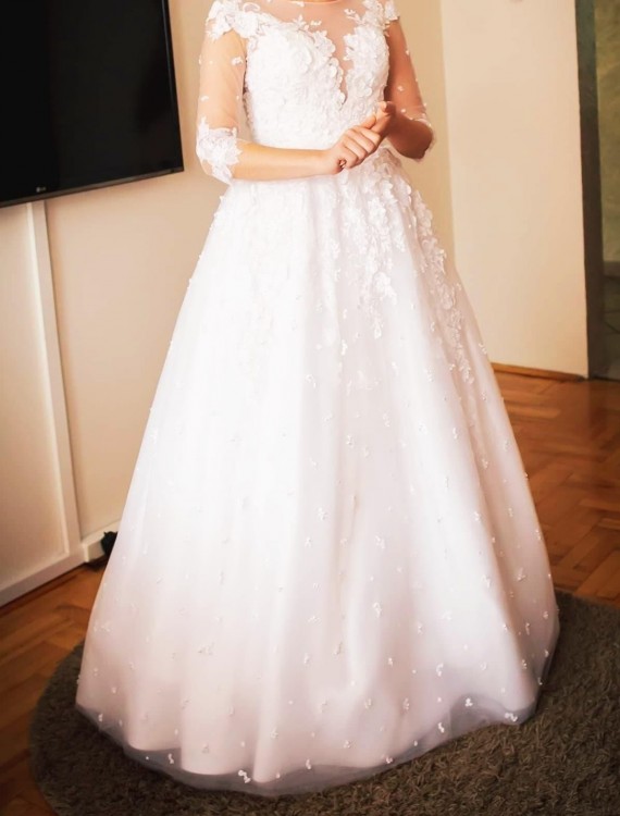 Sprzedam piękną suknię ślubną