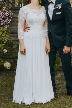 Suknia ślubka o kroju lit. A z koronką