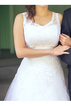 Suknia ślubna dla drobnej osoby z większym biustem