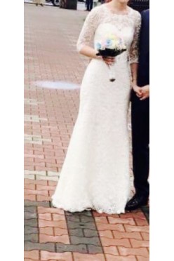 Śmietankowa, koronkowa suknia-syrenka