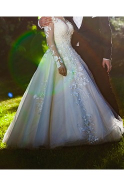 Piękna suknia ślubna z długim rękawem r. 34/36