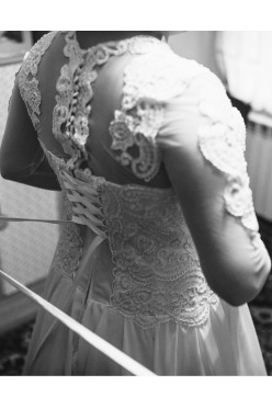 Suknia ślubna ecru z gorsetem ozdabianym koralikami r.42-46