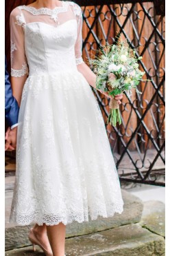 Niepowtarzalna suknia slubna-gruby haft na tiulu