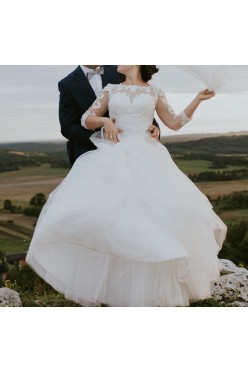 Romantyczna suknia ślubna z rękawem z koronki 2017