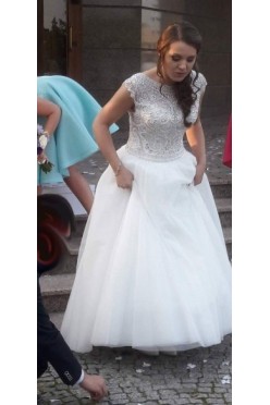 Zachwycająca zdobiona suknia ślubna