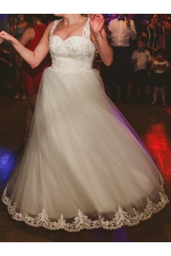 Cudowna suknia ślubna z dwoma welonami