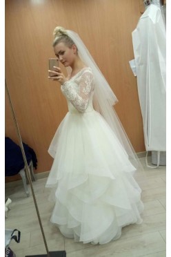 Suknia ślubna falbany