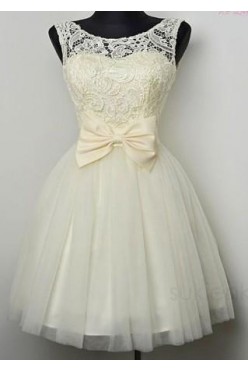 Sukienka r.36 koronka, odpinana kokarda