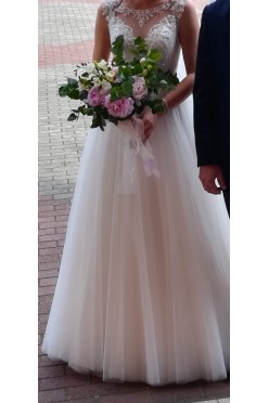 Sprzedam brzoskwiniową suknię ślubną