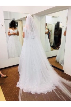 Suknia ślubna- opadające ramiączka