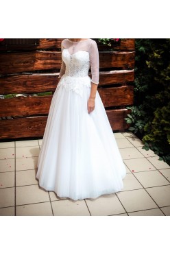 Piękna rozkloszowana biała suknia ślubna z haftami brokat