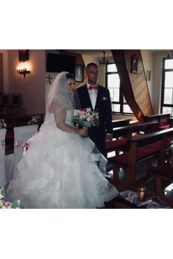 Sprzedam suknie ślubną z falbanami