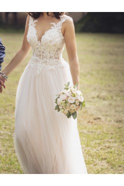 Tiulowa suknia ślubna w stylu boho