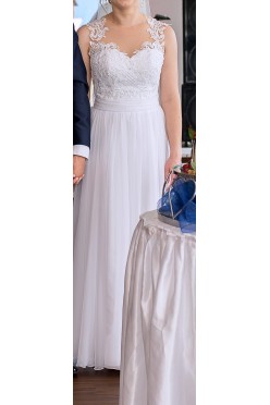 delikatna suknia ślubna