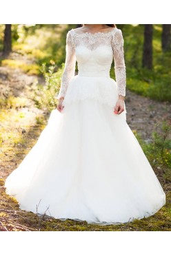 Koronkowa delikatna Suknia ślubna z baskinką
