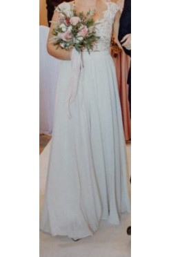 Piękna, lekka suknia ślubna z odpinanym trenem