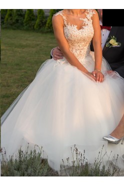 Suknia Ślubna Ms Moda Arsenie - model z brokatowym dołem