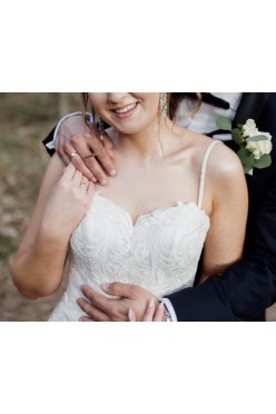 Suknia ślubna w fasonie rybki z podpinanym trenem