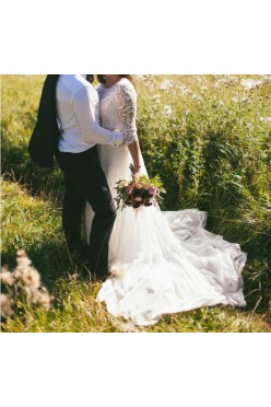 Suknia ślubna Violi Piekut z rozcięciem i trenem rozm. 38/40