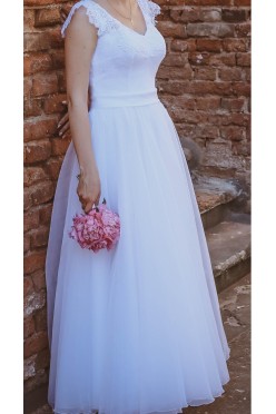 Sprzedam śnieżnobiałą suknię ślubną w rozmiarze 36