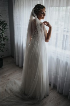 Piękna śmietankowa suknia ślubna