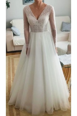 Suknia ślubna z rękawkiem