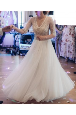 Suknia ślubna z rękawkiem rozmiar 36