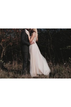 Romantyczna brzoskwiniowa suknia ślubna